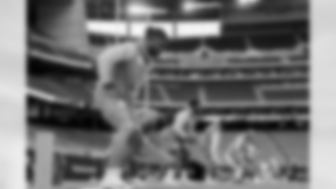 The Los Angeles Chargers prepare to play against the Houston Texans at NRG Stadium on October 2, 2022 in Houston, Texas.