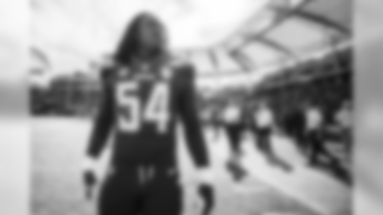 10 - Royalty: "Melvin Ingram has a lot of nicknames, a couple being SupaMel and KingMel. This photo of Ingram was taken a few minutes before kickoff against the Arizona Cardinals. Our royal blue uniforms look good both in color and black and white, and this photo doubles up on the royalty theme with No. 54."