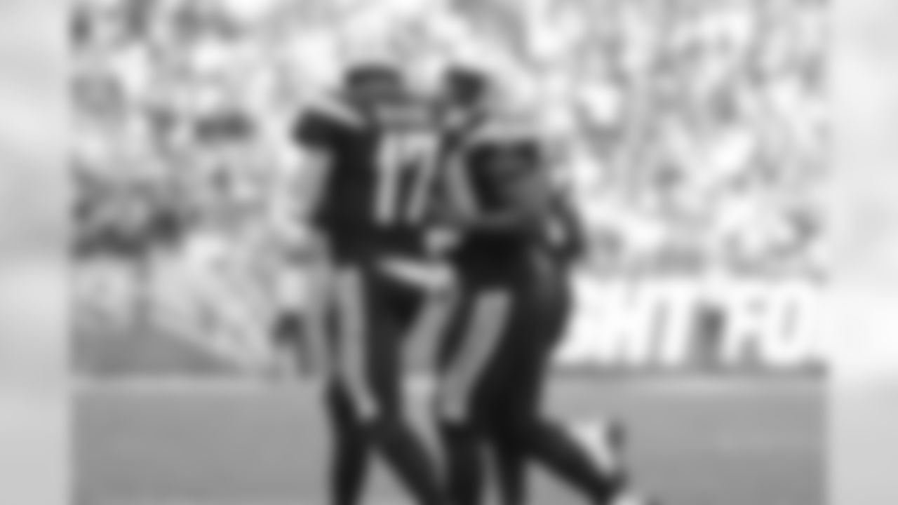 Philip Rivers and Antonio Gates jog off the field after Gates' touchdown during the Week 11 matchup against the Denver Broncos from ROKiT Field at StubHub Center.