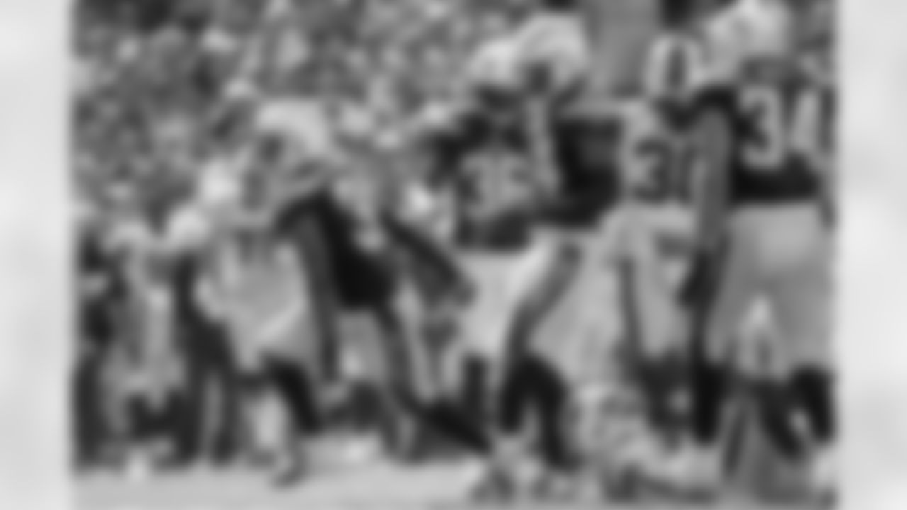 Adrian Phillips celebrates an interception against the Buffalo Bills during the Chargers' Week 2 game at New Era Field.