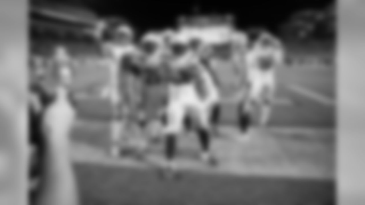 Desmond King and the Bolts defense gather to celebrate touchdown drive during the Week 13 matchup against the Pittsburgh Steelers.