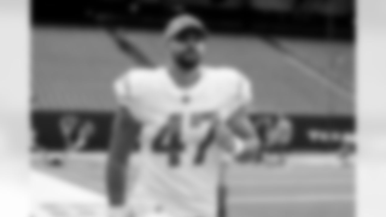 The Los Angeles Chargers prepare to play against the Houston Texans at NRG Stadium on October 2, 2022 in Houston, Texas.