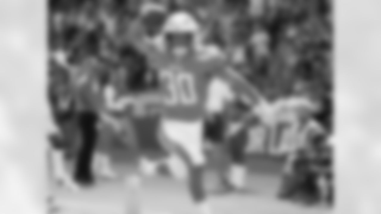 Austin Ekeler celebrates his touchdown during the Week 5 matchup against the Oakland Raiders at ROKiT Field at StubHub Center.