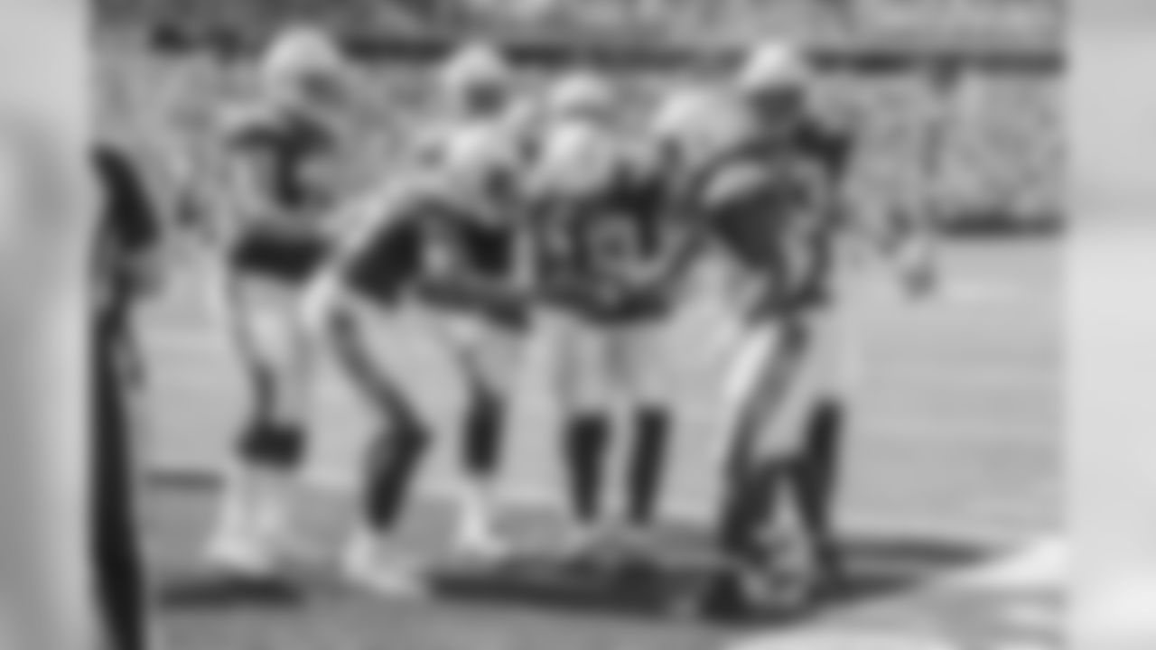 The Bolts celebrate Melvin Gordon's third touchdown of the day against the Buffalo Bills at New Era Field.