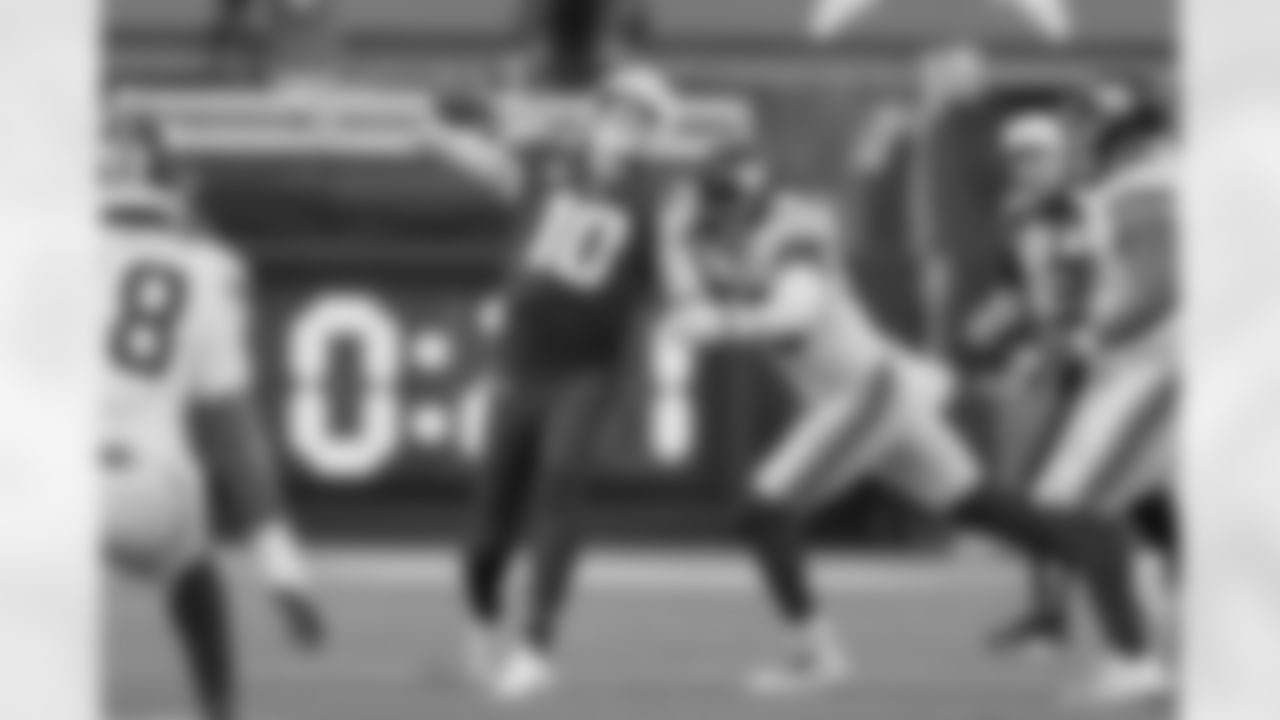 HERBO BOMB - With :23 seconds left in the first half in Week 14, Justin Herbert launched an absolute bomb to wide receiver Jalen Guyton for a 59-yard score. The pass traveled 63.8 yards in the air and went viral - for good reason - but this angle shows just how incredible of a feat it was as Herbert was getting hit as he threw. - Mike Nowak/Los Angeles Chargers