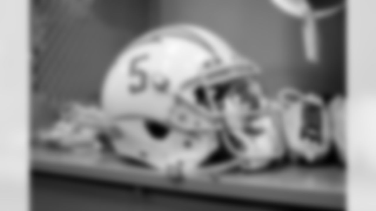 The Los Angeles Chargers prepare to play against the Arizona Cardinals at State Farm Stadium on November 27, 2022 in Glendale, Arizona.