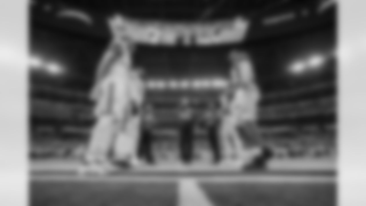 The Los Angeles Chargers prepare to play against the Miami Dolphins at SoFi Stadium on December 11, 2022 in Inglewood, California.