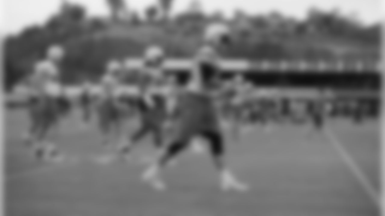 Travis Benjamin works on his ball security in a drill during practice on Wednesday, Dec. 6, 2017.