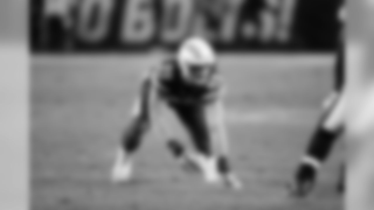 Joey Bosa defends against the Baltimore Ravens at StubHub Center on Saturday, Dec. 22, 2018