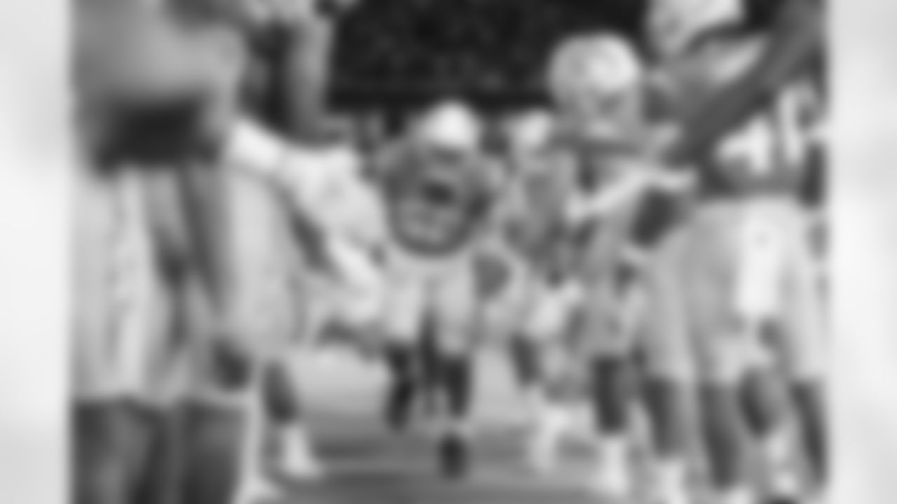 The Los Angeles Chargers prepare to play against the Miami Dolphins at SoFi Stadium on December 11, 2022 in Inglewood, California.