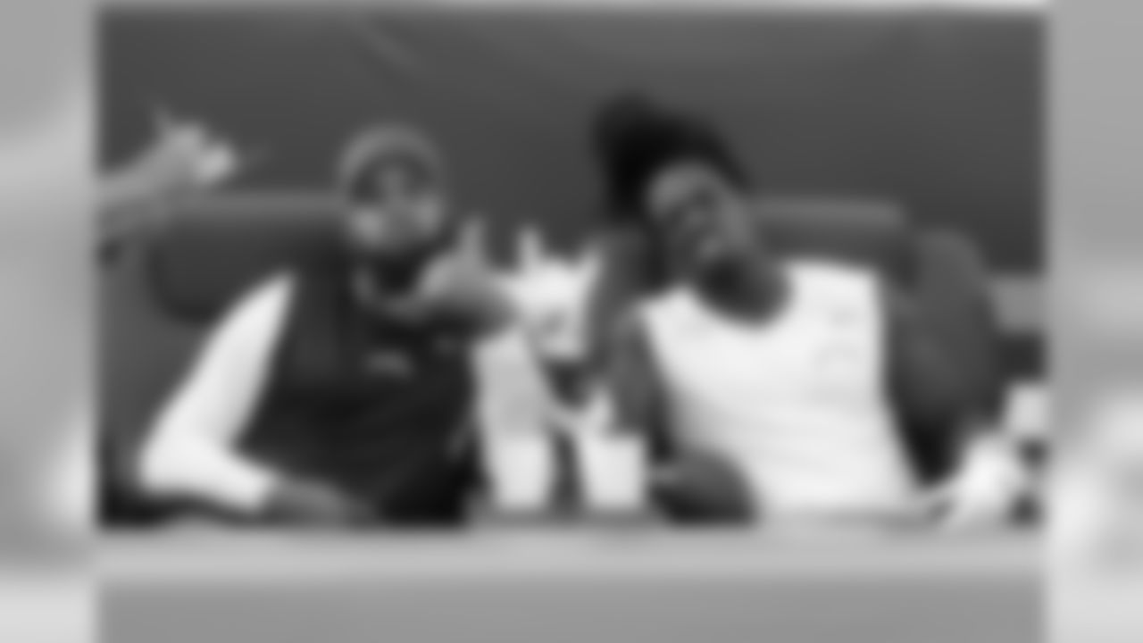 Keenan Allen and Melvin Gordon pose for photos before the Bolts take on the San Francisco 49ers in the last preseason game at Levi's Stadium. (AP Photo/Josie Lepe)