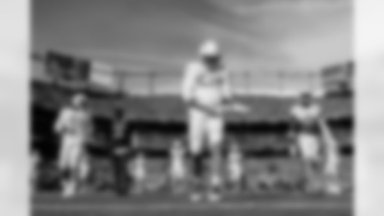 The Los Angeles Chargers prepare to play against the Denver Broncos at Empower Field at Mile High on January 8, 2023 in Denver, Colorado.