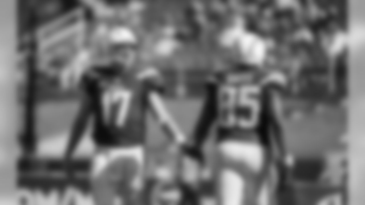 Philip Rivers and Antonio Gates slap hands during the Bolts' Week 3 matchup against the Rams at the LA Memorial Coliseum.