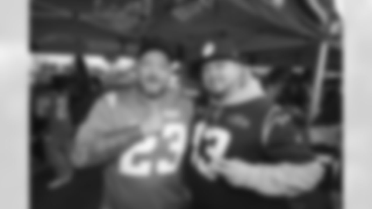 Bolt Fam show up at SoFi Stadium to root against the Miami Dolphins on December 11, 2022 in Inglewood, California.