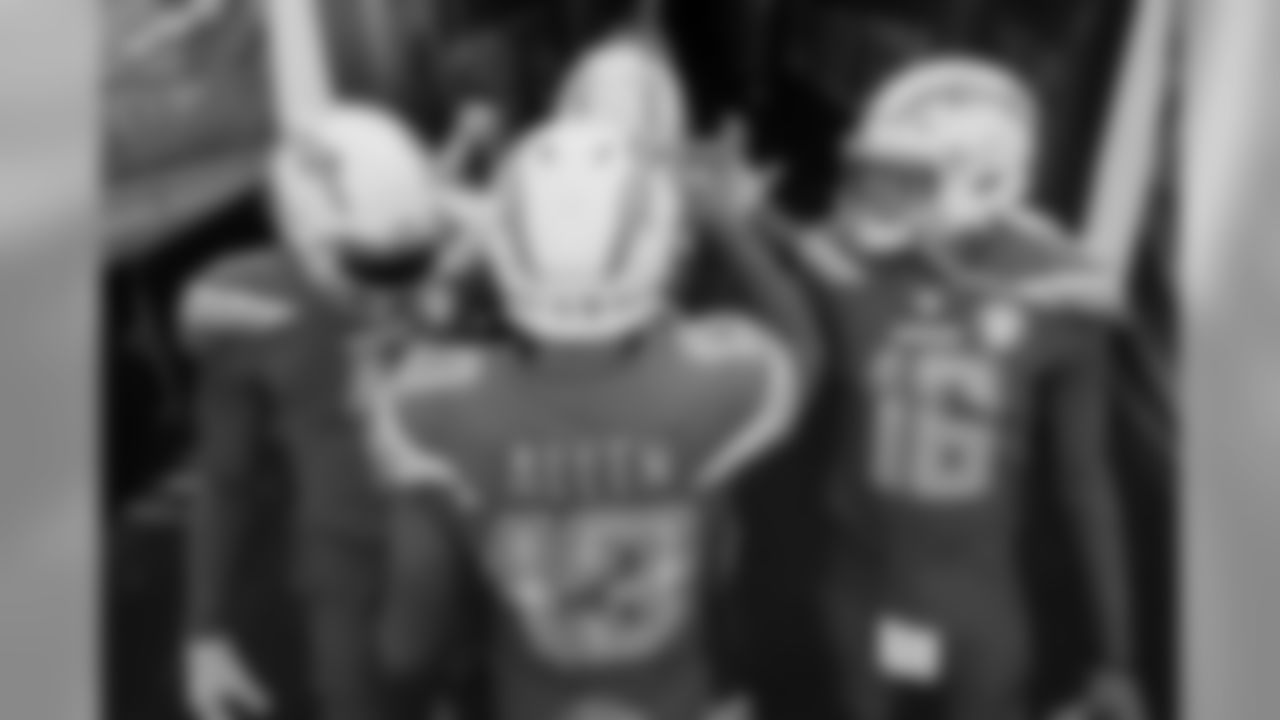 Geremy Davis, Keenan Allen and Tyrell Williams slap hands before taking the field for the Week 12 matchup against the Arizona Cardinals.