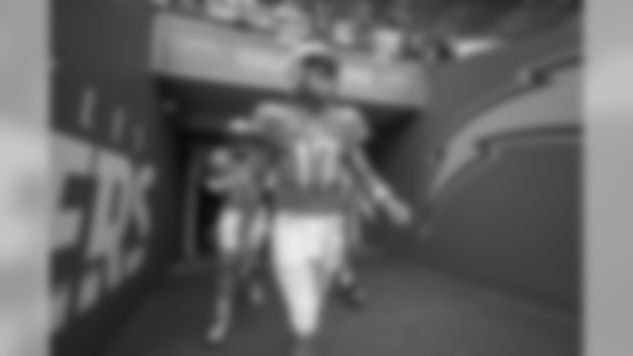 Philip Rivers walks out to the field to warm up at Wembley Stadium in London before the Week 7 matchup against the Tennessee Titans.