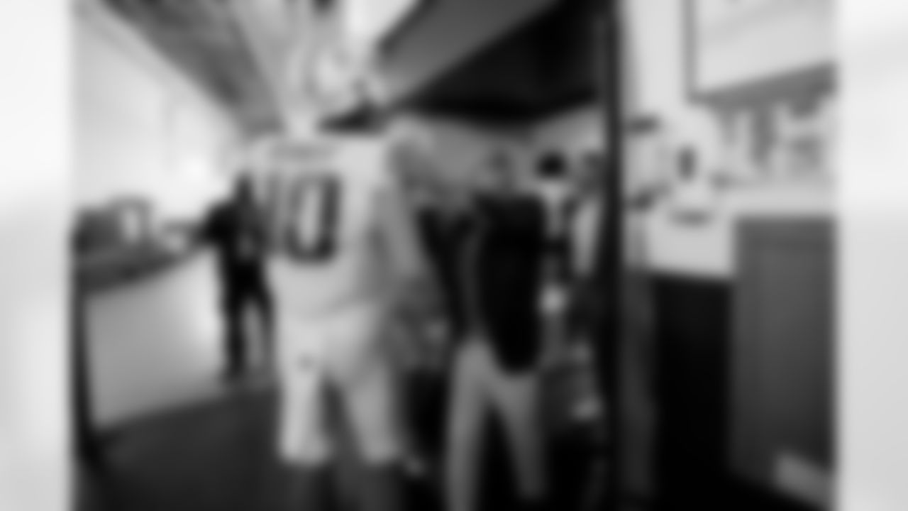 The Los Angeles Chargers celebrate their 34-24 victory over the Houston Texans at NRG Stadium on October 2, 2022 in Houston, Texas.