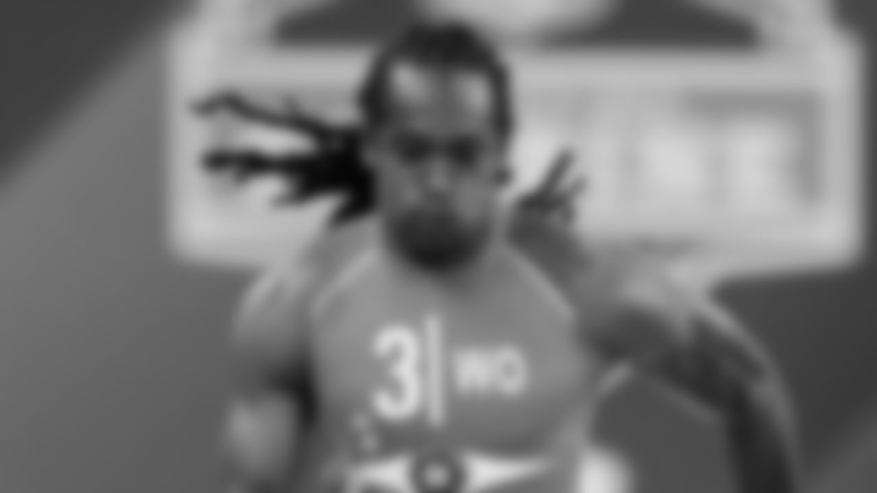 Travis Benjamin runs the 40-yard dash at the NFL Scouting Combine.