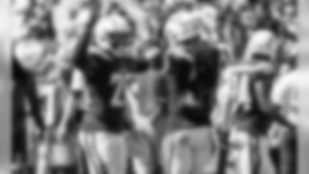 Desmond King and Jahleel Addae celebrate a forced fumble during the Bolts' Week 3 matchup against the Rams at the LA Memorial Coliseum.