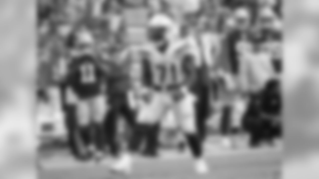 Damion Square celebrates a tackle during the Bolts' matchup against the 49ers at ROKiT Field at StubHub Center.