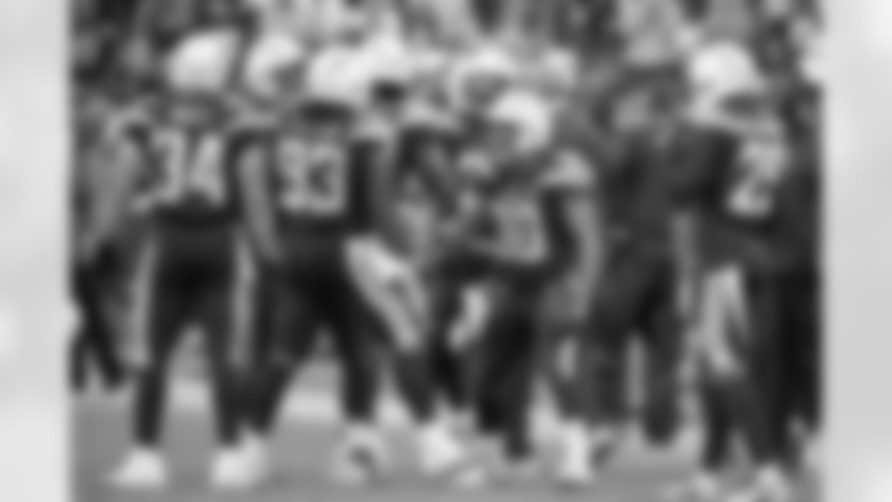 The Bolts celebrate Darius Philon's sack on QB Jeff Driskel during the Week 14 matchup against the Cincinnati Bengals at ROKiT Field at StubHub Center.