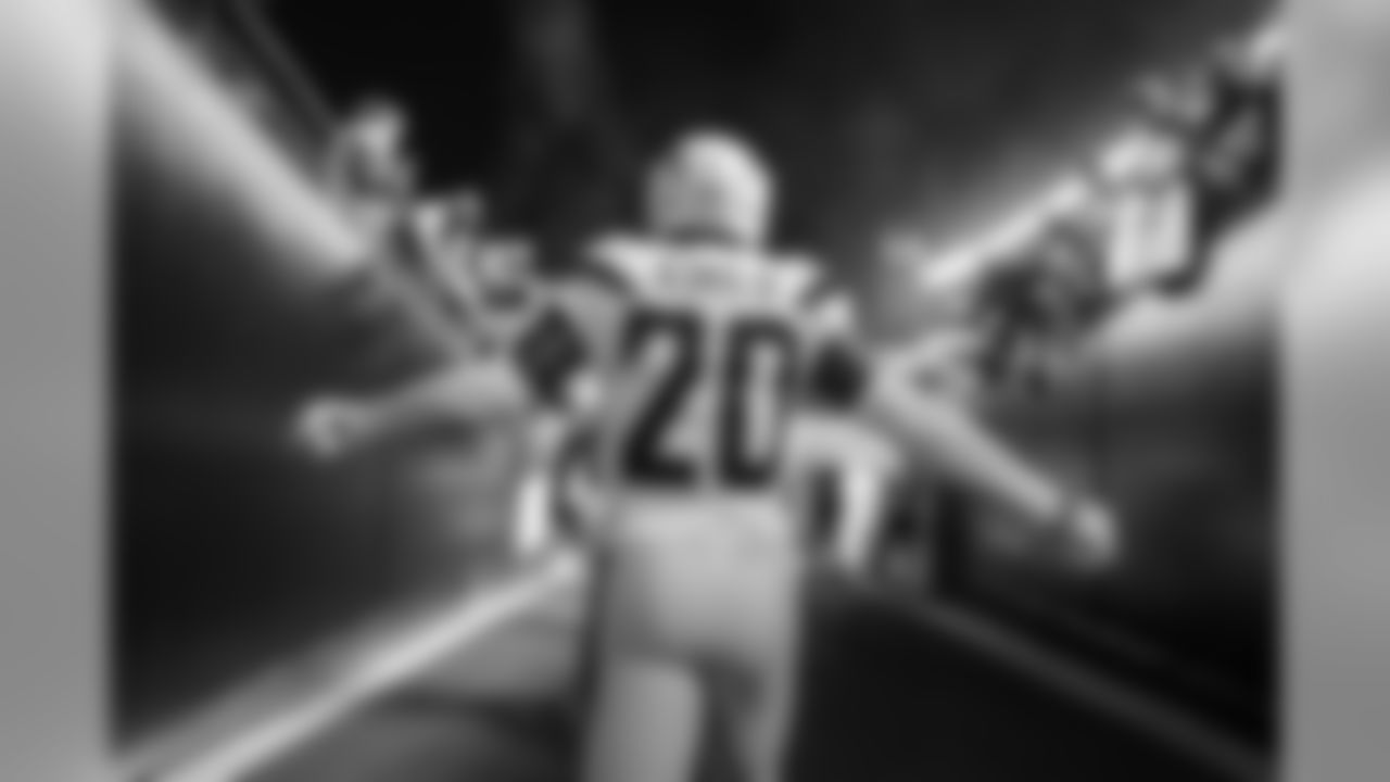Desmond King walks out to the field before the Week 13 matchup against the Pittsburgh Steelers at Heinz Field.