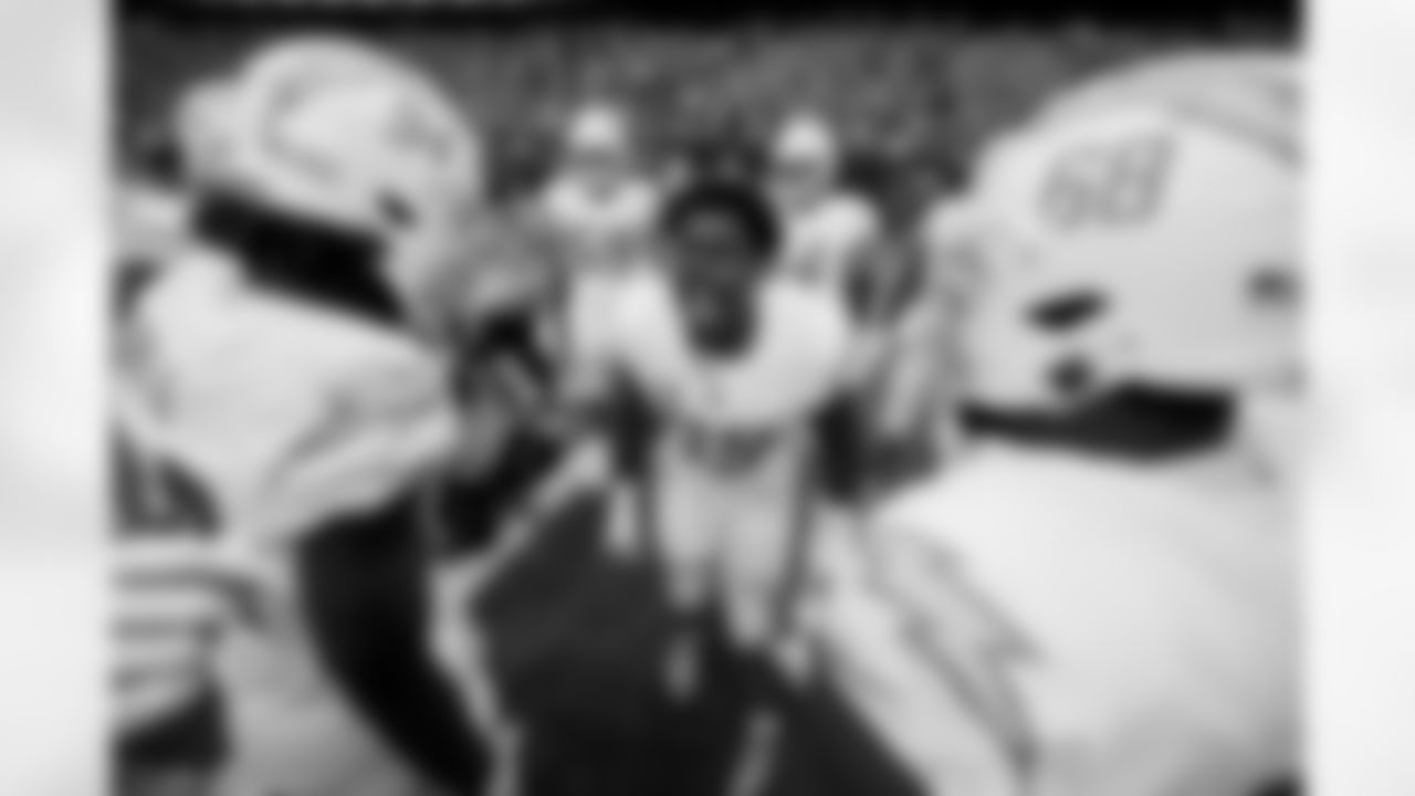 The Los Angeles Chargers prepare to play against the Houston Texans at NRG Stadium on October 2, 2022 in Houston, Texas.