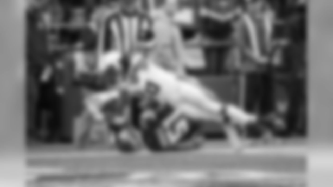 Melvin Gordon diving into the end zone for a touchdown at CenturyLink Field on Sunday, November 4, 2018.
