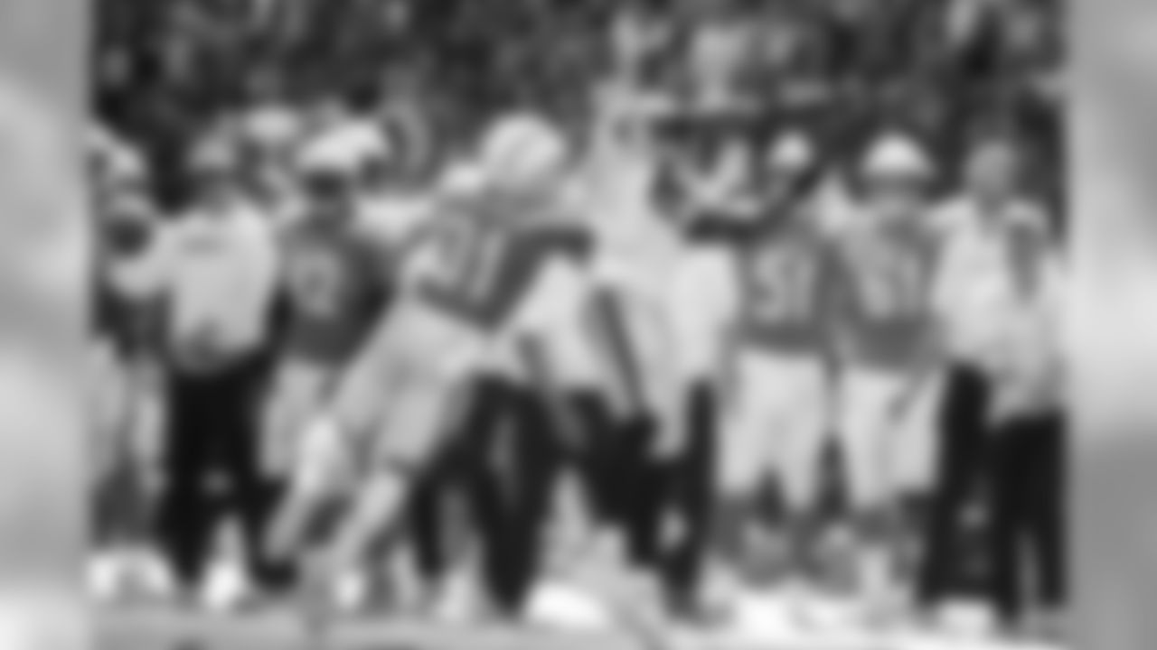 Adrian Phillips pushes Raiders WR out of bounds during the Week 5 matchup against the Oakland Raiders at ROKiT Field at StubHub Center.