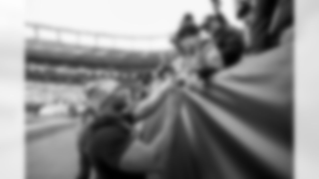 The Los Angeles Chargers prepare to play against the Denver Broncos at Empower Field at Mile High on January 8, 2023 in Denver, Colorado.