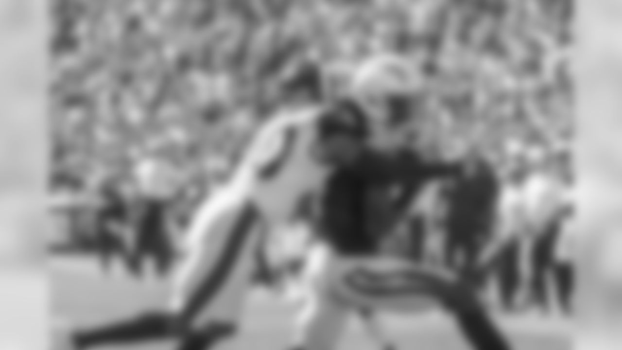 Mike Williams holds on to the ball for a touchdown during the Bolts' matchup against the LA Rams at the LA Memorial Coliseum.