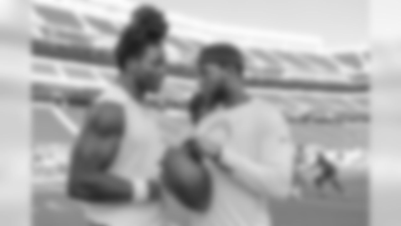 Melvin Gordon and Casey Hayward during warmups before the Bolts take on the San Francisco 49ers in the last preseason game at Levi's Stadium.