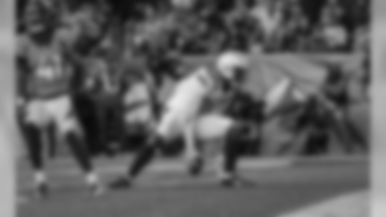 Mike Williams celebrates scoring a touchdown during the Week 17 contest against the Denver Broncos.