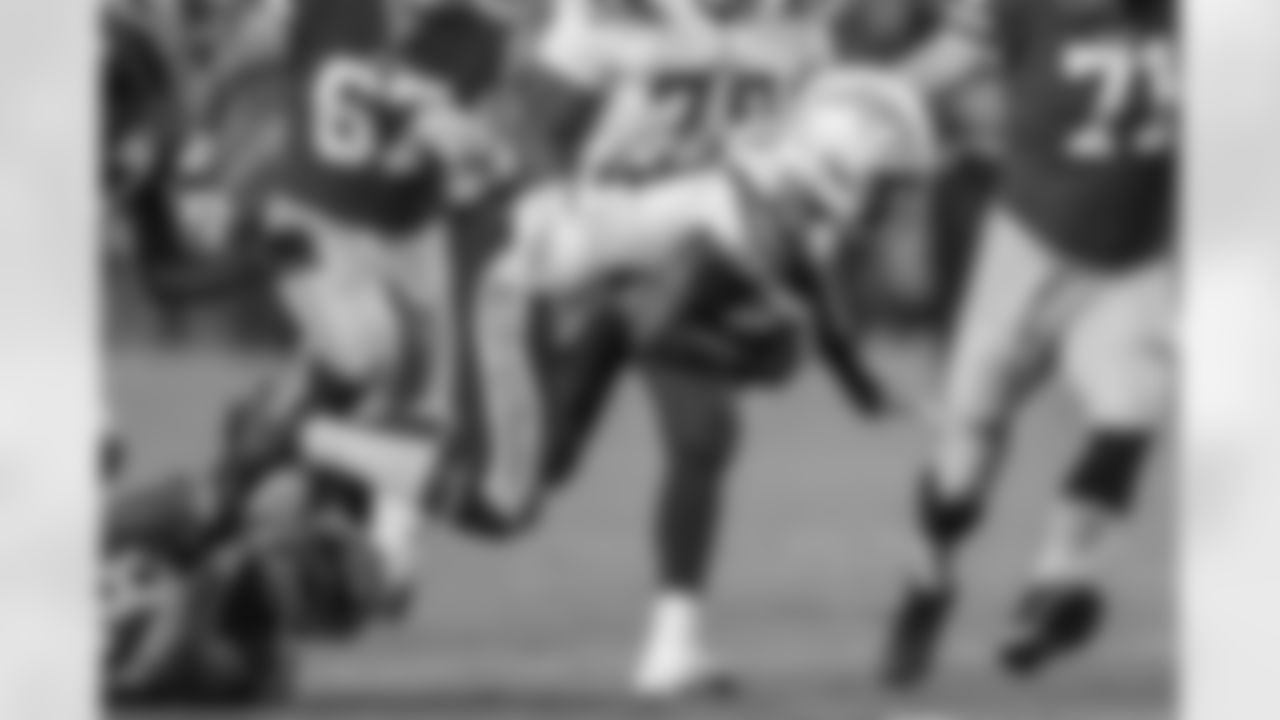 Tony Brown recovers the ball after a forced fumble by Chris Landrum against the San Francisco 49ers during the last preseason game.