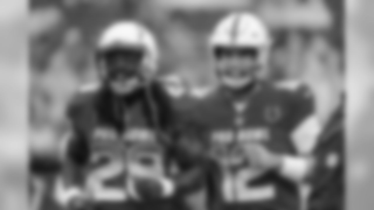 Colts QB Andrew Luck and Melvin Gordan run onto the field during the 2019 Pro Bowl on Sunday, Jan. 27, 2019, in Orlando, FL.