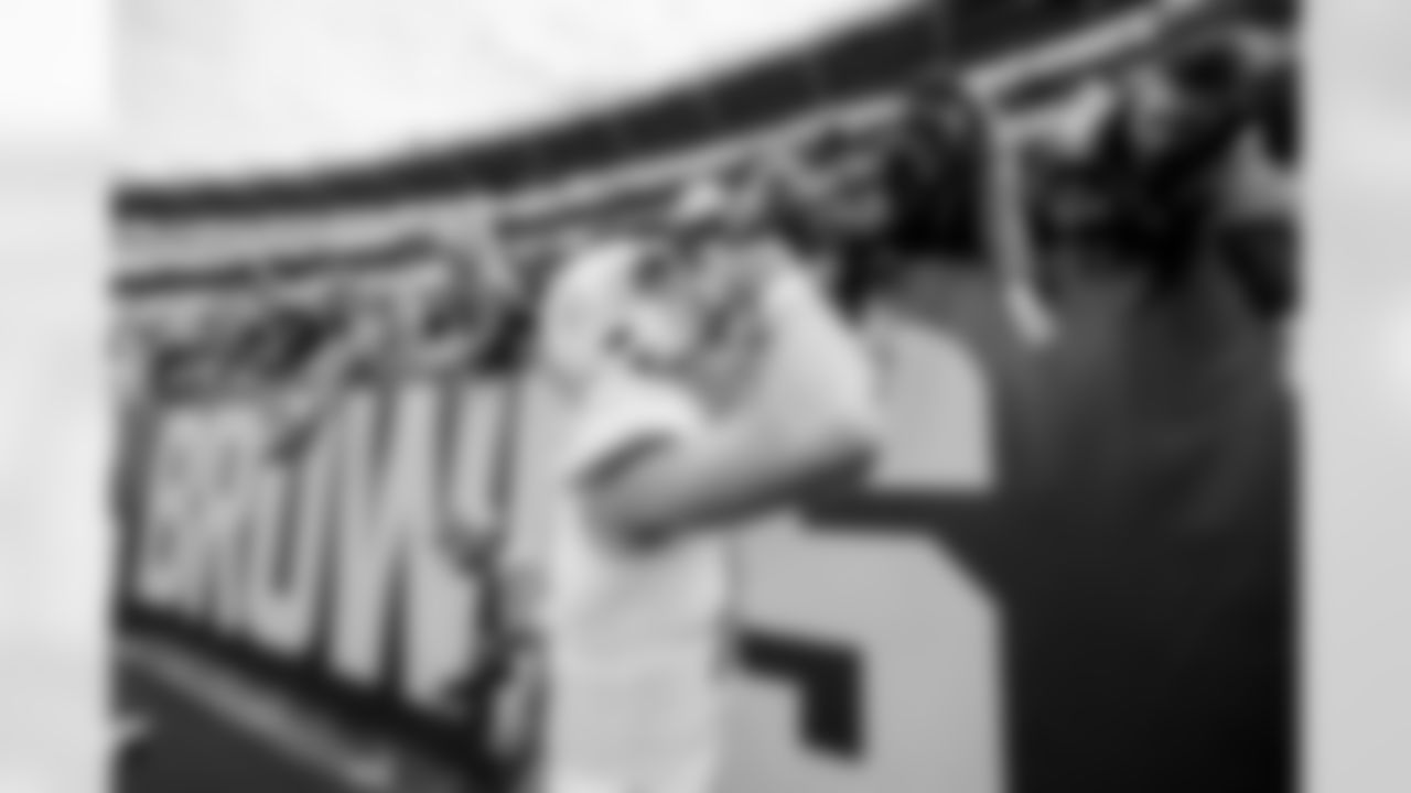 The Los Angeles Chargers celebrate their 30-28 victory over the Cleveland Browns at FirstEnergy Stadium on October 9, 2022 in Cleveland, Ohio.