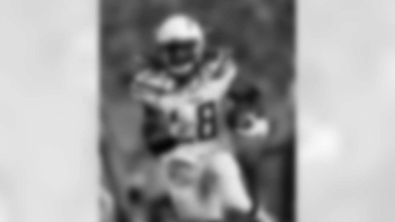 Los Angeles Chargers running back Melvin Gordon (28) runs against the Denver Broncos during the first half of an NFL football game, Monday, Sept. 11, 2017, in Denver. (AP Photo/David Zalubowski)