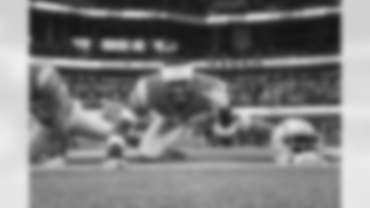 The Los Angeles Chargers prepare to play against the Miami Dolphins at SoFi Stadium on December 11, 2022 in Inglewood, California.