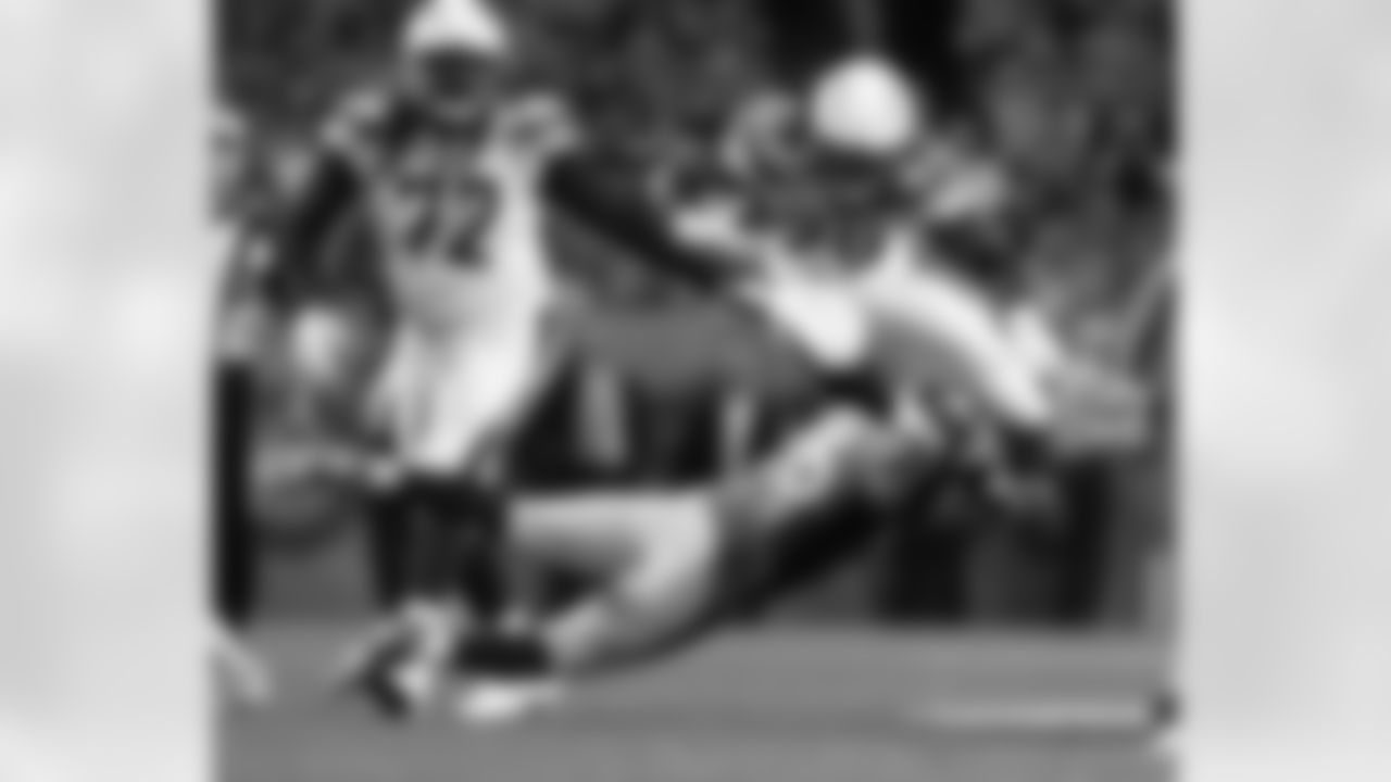 Los Angeles Chargers running back Melvin Gordon (28) is hit by Denver Broncos free safety Darian Stewart (26) during the first half of an NFL football game, Monday, Sept. 11, 2017, in Denver. (AP Photo/Jack Dempsey)