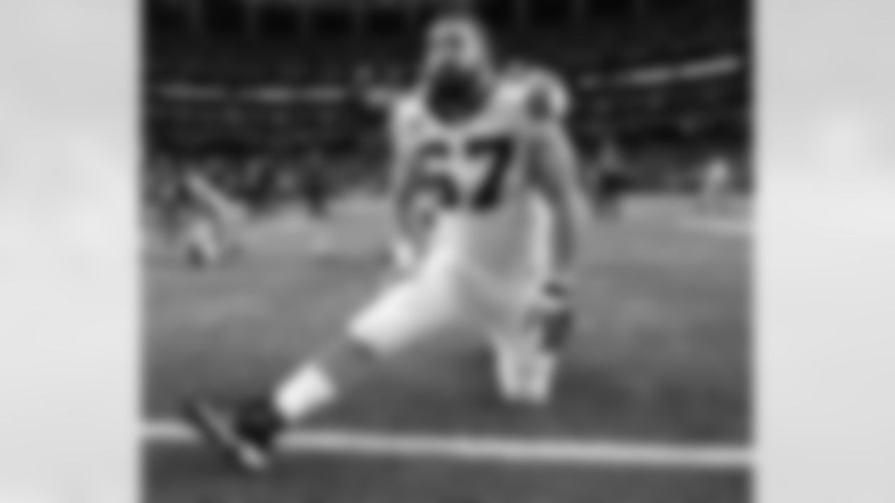 Carolina Panthers center Ryan Kalil (67) stretches before the game against the Atlanta Falcons in an NFL game, Sunday, Dec. 27, 2015, in Atlanta, GA. (AP Photo/Kent Smith)