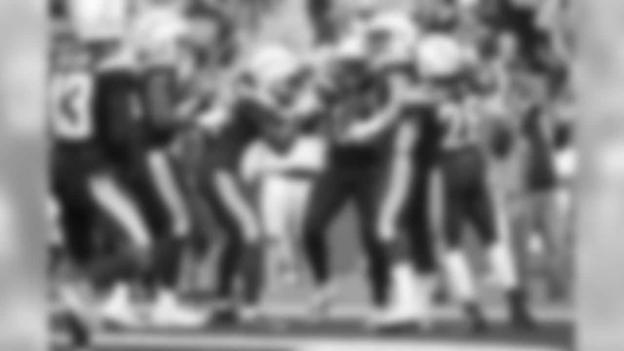 Antonio Gates celebrates with teammates after a touchdown during Week 11's Salute to Service game versus the Denver Broncos on Sunday, November 18, 2018 at StubHub Center.
