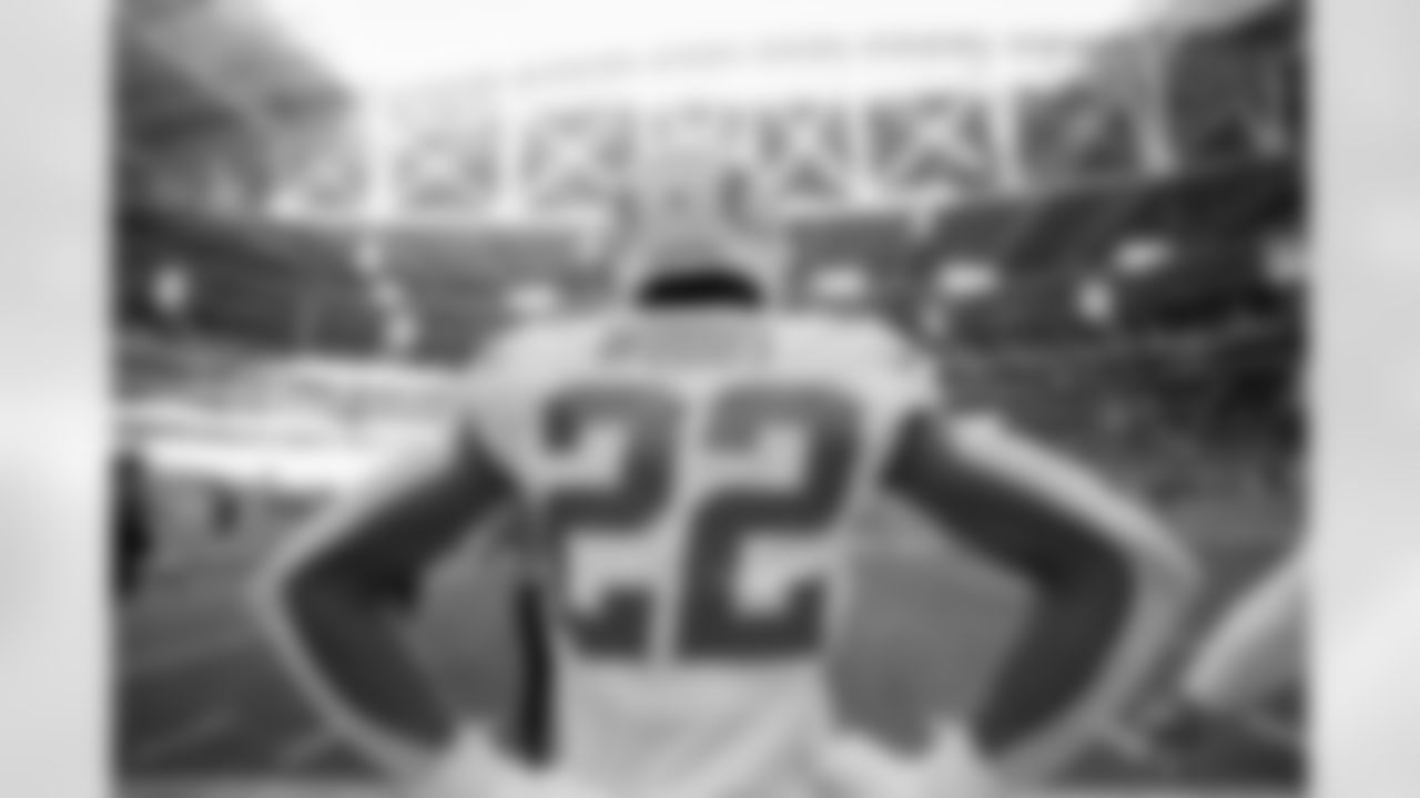 The Los Angeles Chargers prepare to play against the Arizona Cardinals at State Farm Stadium on November 27, 2022 in Glendale, Arizona.