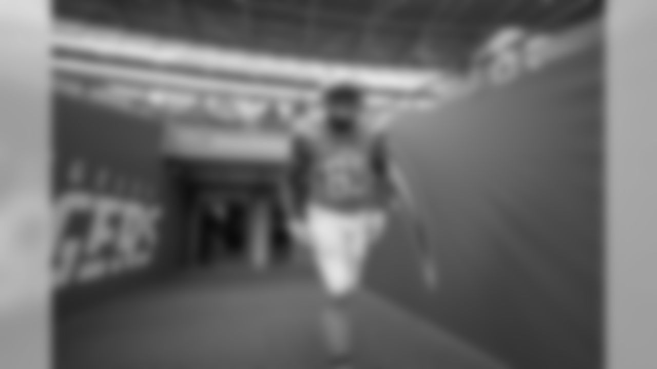 Antonio Gates walks out to the field at Wembley Stadium in London to warm up before the Week 7 matchup against the Tennessee Titans.