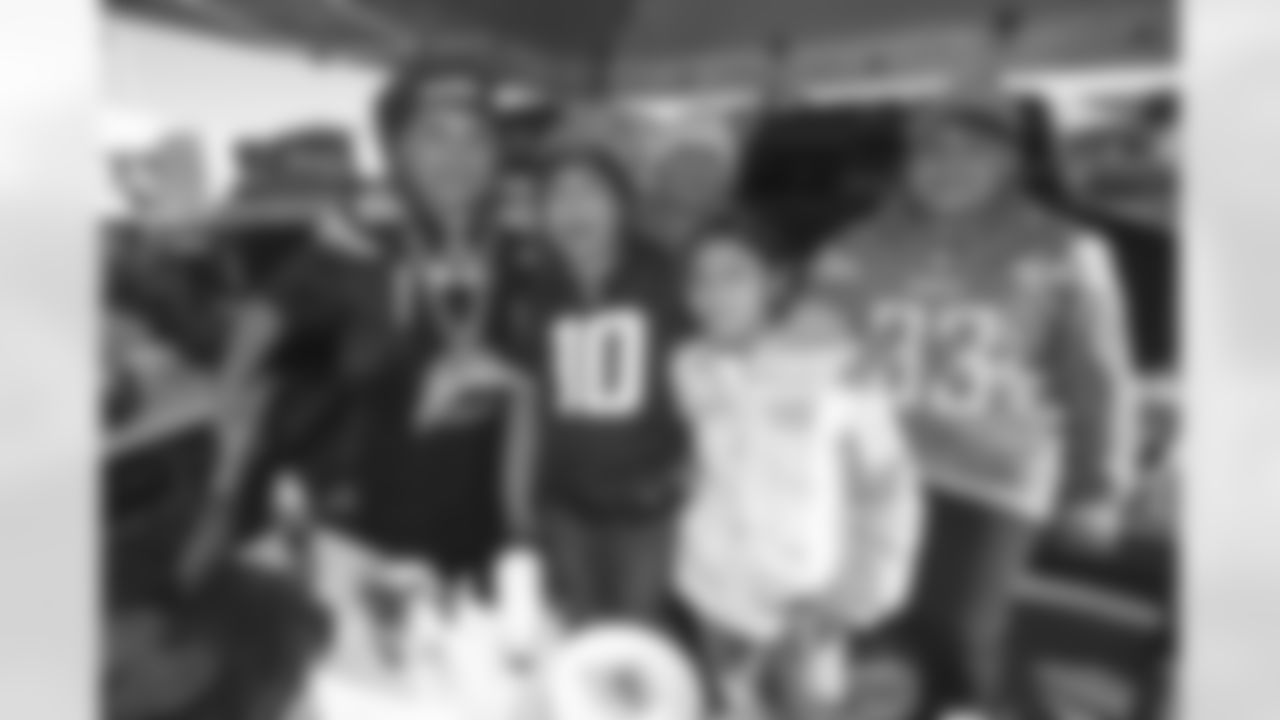 Bolt Fam show up at SoFi Stadium to root against the Tennessee Titans on December 11, 2022 in Inglewood, California.