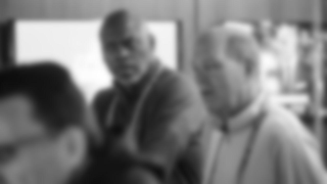 Head coach Anthony Lynn is seen alongside tight end coach Rip Scherer inside the Chargers viewing suite at the 2019 NFL Scouting Combine at Lucas Oil Stadium in Indianapolis.