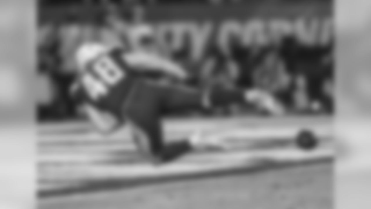 Nick Dzubnar keeps the punt out of the end zone during the Week 16 matchup against the Baltimore Ravens at ROKiT Field at StubHub Center.