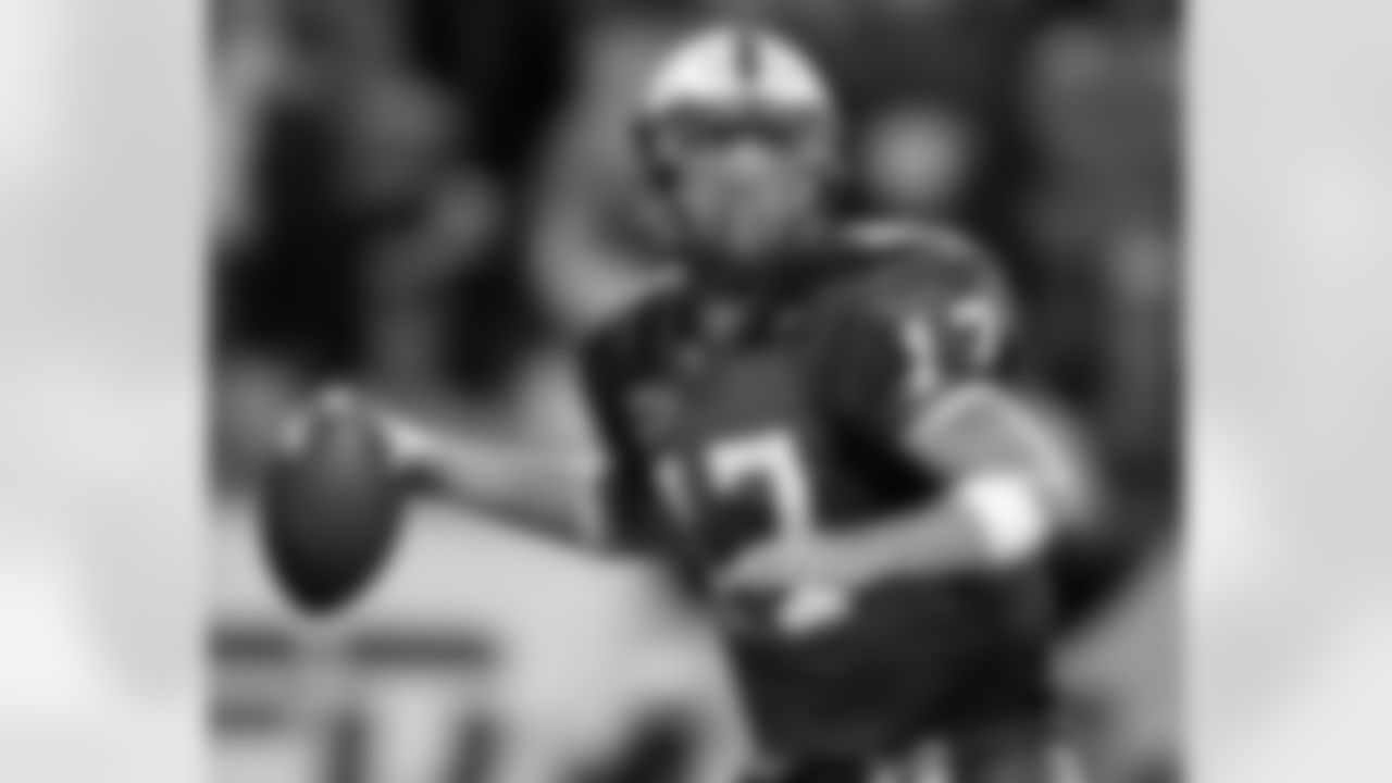 North Carolina State quarterback Philip Rivers (17) drops back to pass during his team's 17-15 win over Clemson on Thursday, Oct. 16, 2003, in Raleigh, N.C. (AP Photo/Grant Halverson)