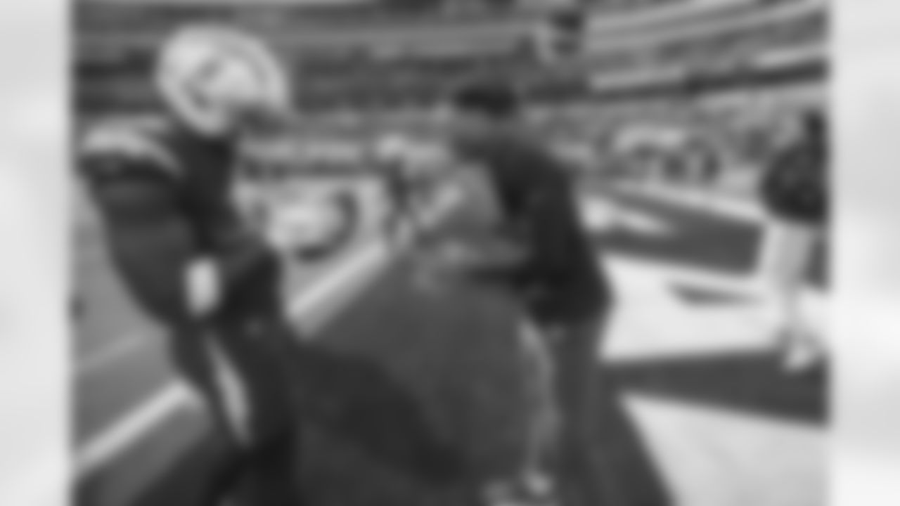The Los Angeles Chargers prepare to play against the Tennessee Titans at SoFi Stadium on December 18, 2022 in Inglewood, California.