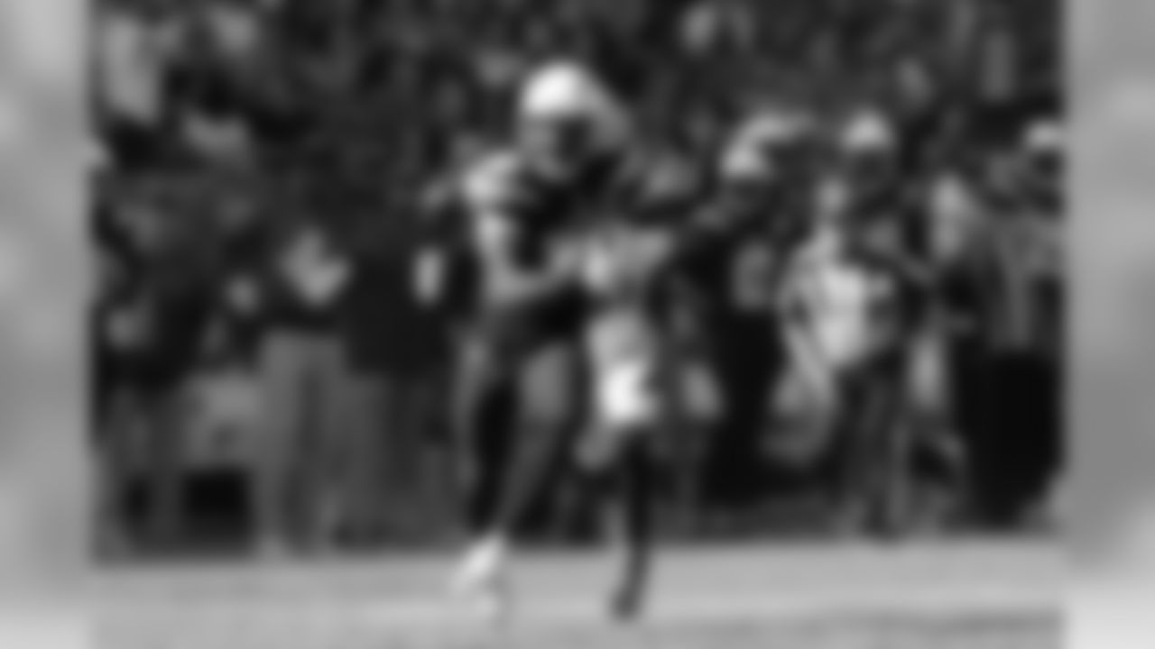 Virgil Green carries the ball during Week 11's Salute to Service game versus the Denver Broncos on Sunday, November 18, 2018 at StubHub Center.