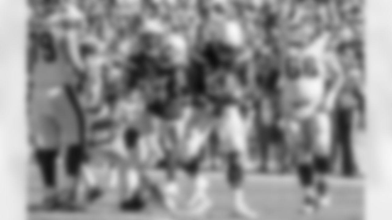 Melvin Ingram celebrates after tackling Los Angeles Rams running back Todd Gurley II at LA Memorial Coliseum on Sunday, September 23, 2018.